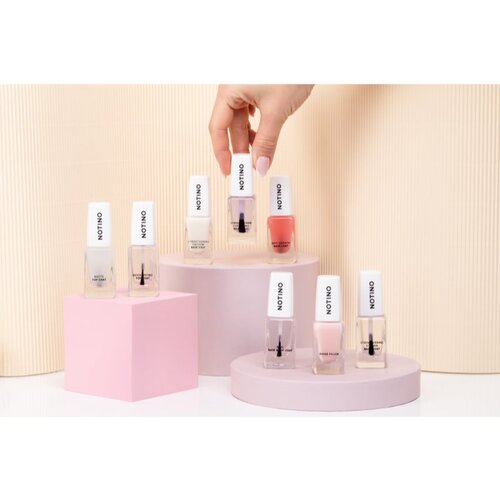 Notino Nail Care Strengthening Vitamin Base Coat negovalni lak za nohte z vitamini A, C, E 10 ml Slike