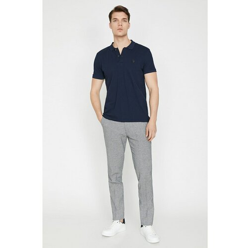 Koton men's navy blue patterned navy blue normal waist slim fit pocket detailed trousers Cene