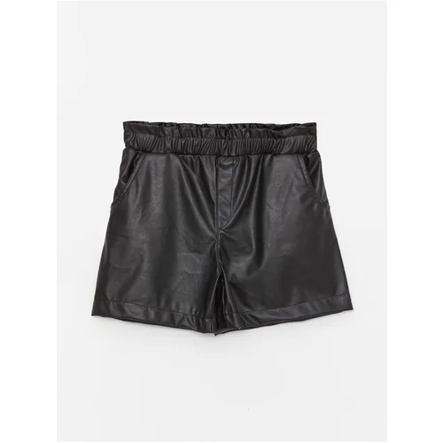 LC Waikiki Girl's Leather-Look Shorts with Elastic Waist.