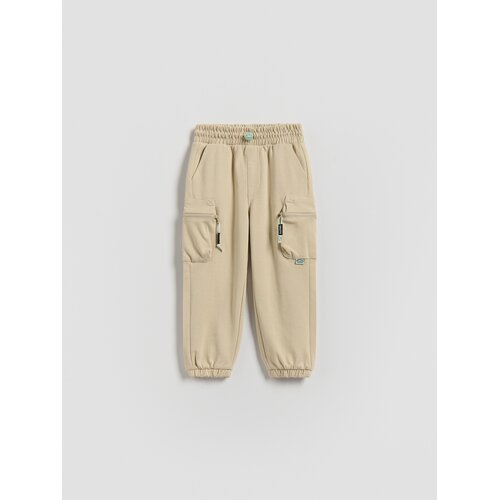 Reserved Pamučne jogger hlače - bež Cene