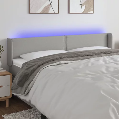 vidaXL LED posteljno vzglavje svetlo sivo 163x16x78/88 cm blago