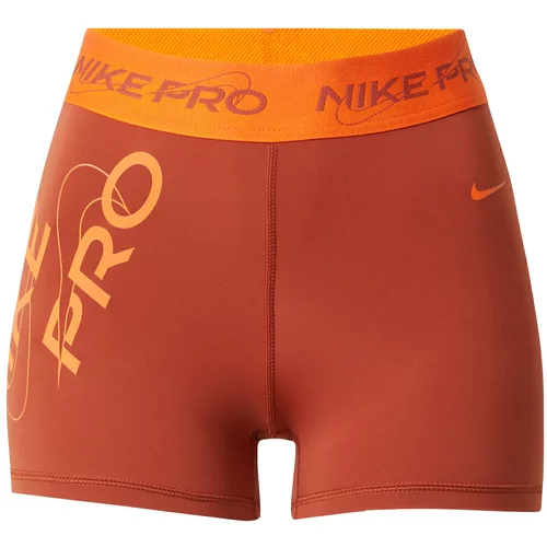 Nike Športne hlače oranžna / korala