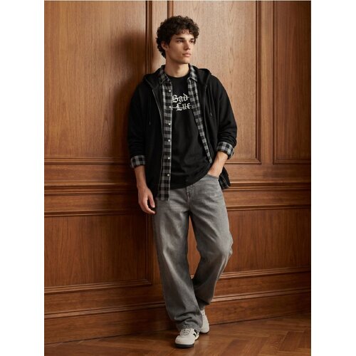 Sinsay Pamučna loose majica s natpisom Bad Luck Cene