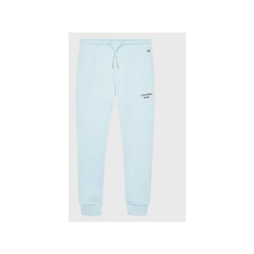 Calvin Klein Jeans Spodnji del trenirke Stack Logo IB0IB01282 Modra Regular Fit