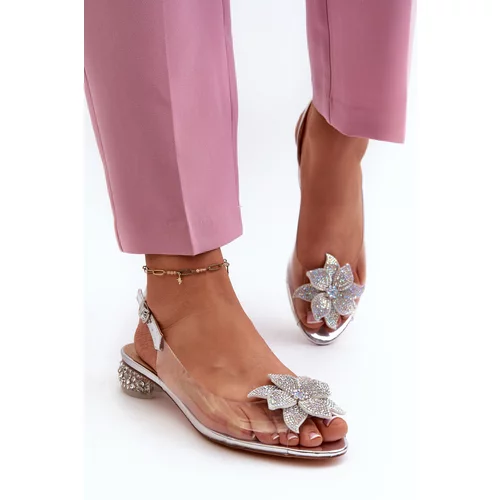 Kesi Transparent low-heeled sandals with silver D&A embellishment