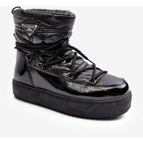 Kesi Women's lace-up platform snow boots in black Fleure
