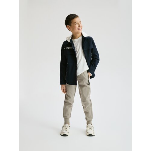 Reserved Pamučne jogger hlače - bež Cene