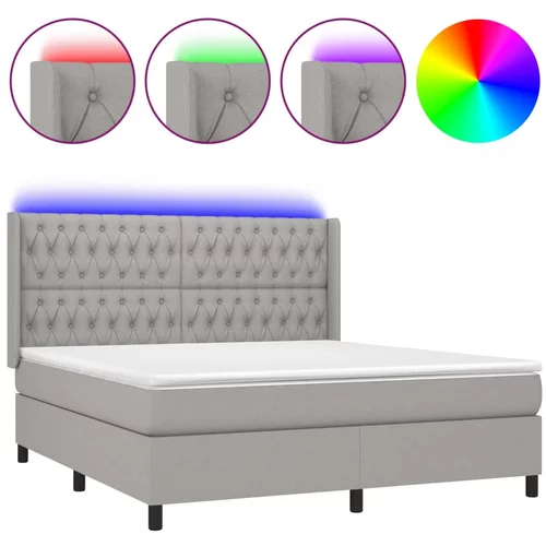 vidaXL Box spring postelja z vzmetnico LED sv. siva 160x200 cm blago, (20788995)