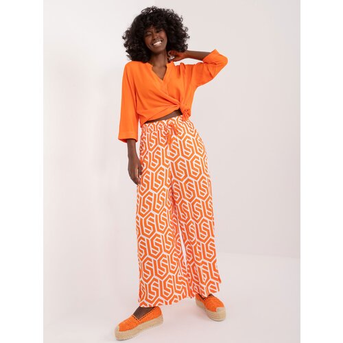 Fashion Hunters Orange wide trousers with SUBLEVEL print Cene