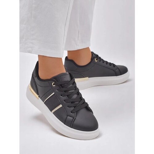 Resti Women's sports sneakers on a thicker sole Montanas Cene