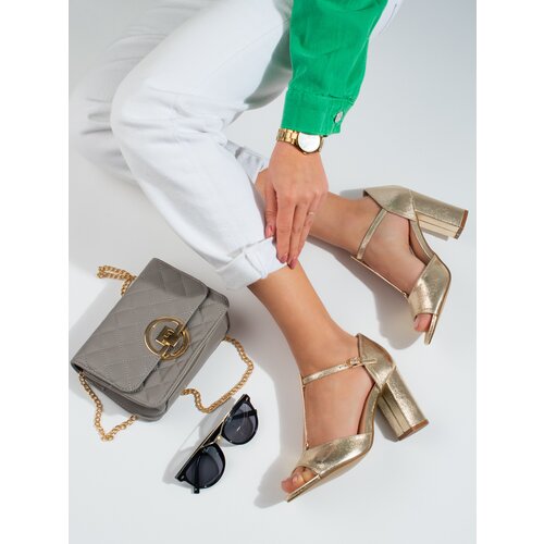 SHELOVET Gold women's classic sandals on a high post Cene