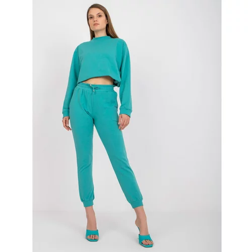 Fashion Hunters Basic dusty green sweatpants with a tie detail