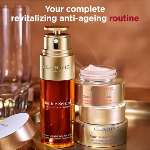 Clarins Nutri-Lumi&amp;egrave;re Revitalizing Day Cream poživljajoča dnevna krema 50 ml za ženske Slike
