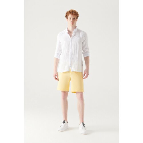 Avva yellow 100% cotton shorts with side pockets, elastic waist, linen textured relaxed fit shorts. Slike