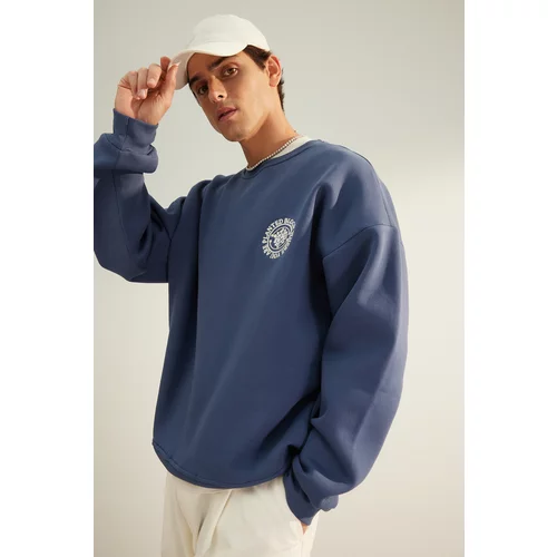 Trendyol Indigo Men's Oversize Floral Embroidery Cotton Sweatshirt with a Soft Pile Inside.