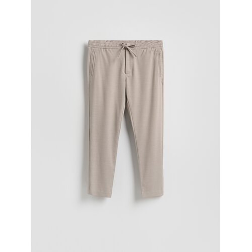 Reserved Jogger hlače - bež Cene