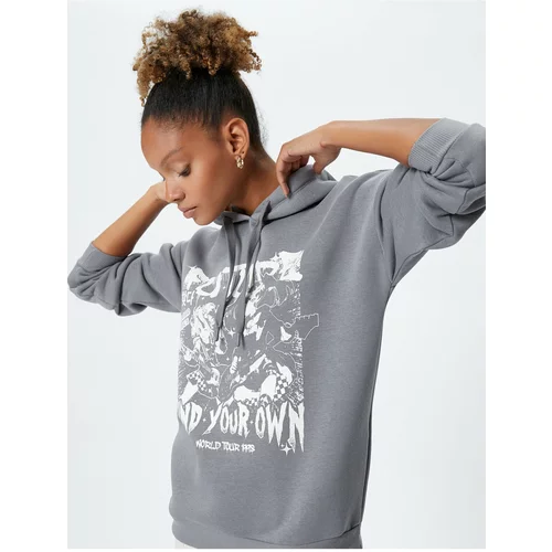 Koton Hooded Sweatshirt with a slogan printed, comfortable fit with long sleeves.