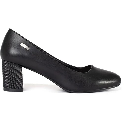 Sergio Leone s classic black pumps Cene