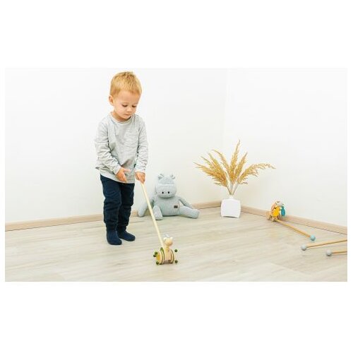 Zopa drvena igračka guralica Dinosaur green Slike