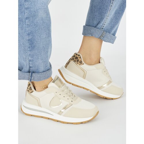 Shelvt Women's beige trainers Slike