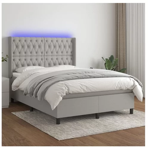 vidaXL Box spring postelja z vzmetnico LED svetlo siva 140x1