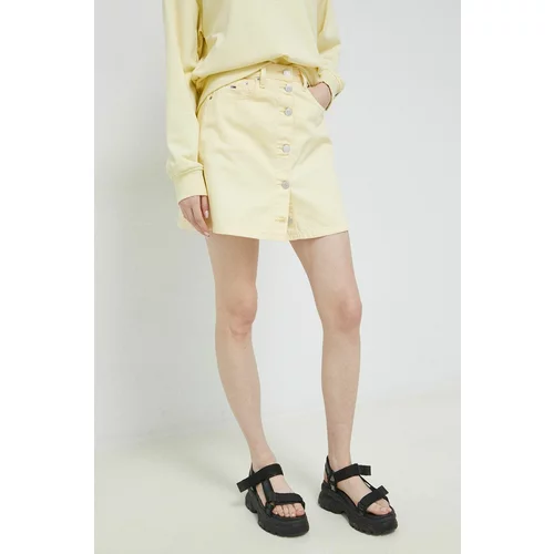 Tommy Jeans Traper suknja boja: žuta, mini, širi se prema dolje