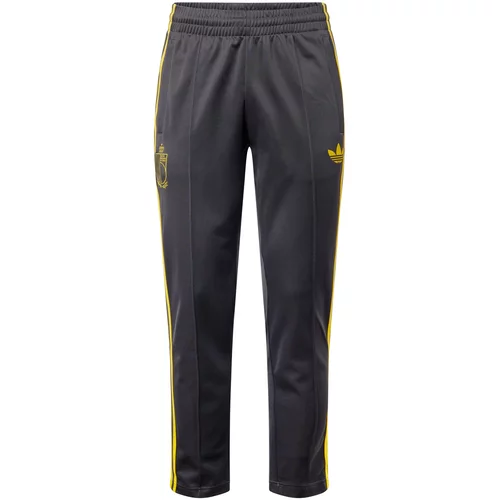 Adidas Športne hlače temno rumena / rdeča / črna