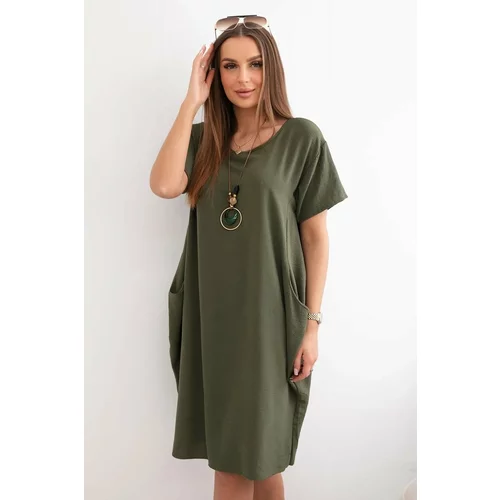 Kesi Dress with pockets and pendant in khaki color