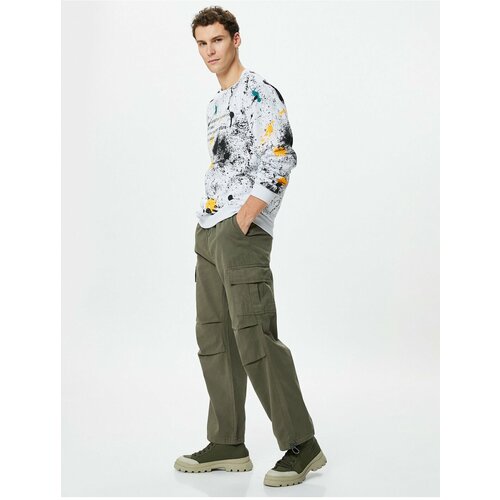 Koton The Parachute Trousers are in a loose fit with Stopper Cargo with Pocket Detail. Slike
