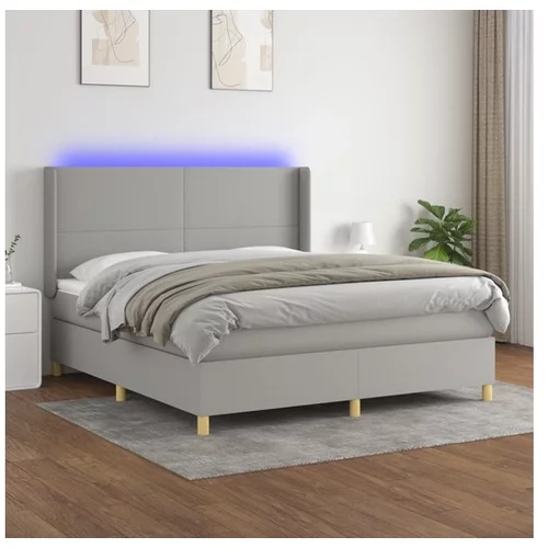  Box spring postelja z vzmetnico LED sv. siva 180x200 cm blago