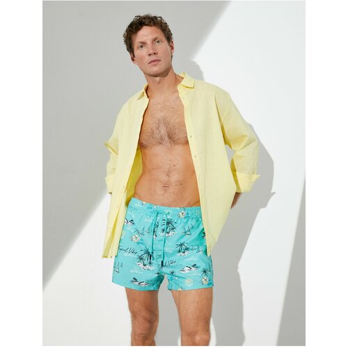 Koton Beach Shorts Summer Theme with a drawstring waist and pockets. Slike