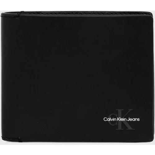 Calvin Klein Jeans Usnjena denarnica ženska, črna barva, K50K512171