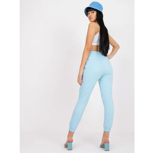 Fashion Hunters Basic light blue sweatpants with a Shail binding