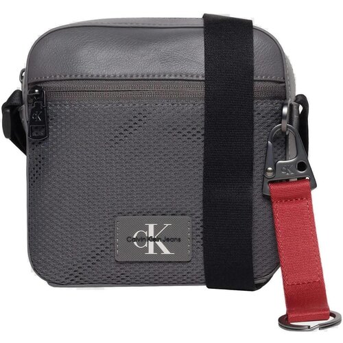 Calvin Klein Jeans Torbe TAGGED SQUARE CAMERA 18 K50K511779 Siva Cene