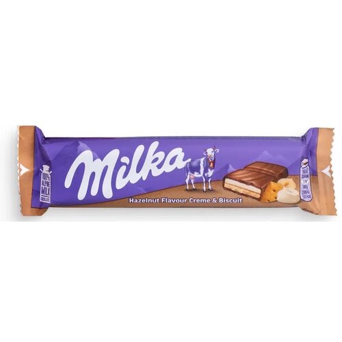 Milka Čokoladica HAZELNUT FLAVOR CREME & BISCUIT 46G Cene