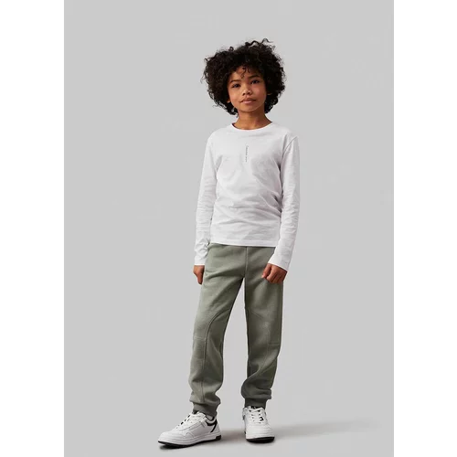 Calvin Klein Jeans Dječji donji dio trenirke FLEECE JOGGER boja: zelena, bez uzorka, IB0IB02123