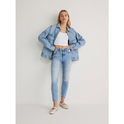Reserved kavbojke slim push up - modra Cene
