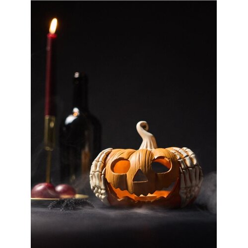 Sinsay Halloween svijećnjak za LED svijeće u obliku bundeve s rukama kostura Slike