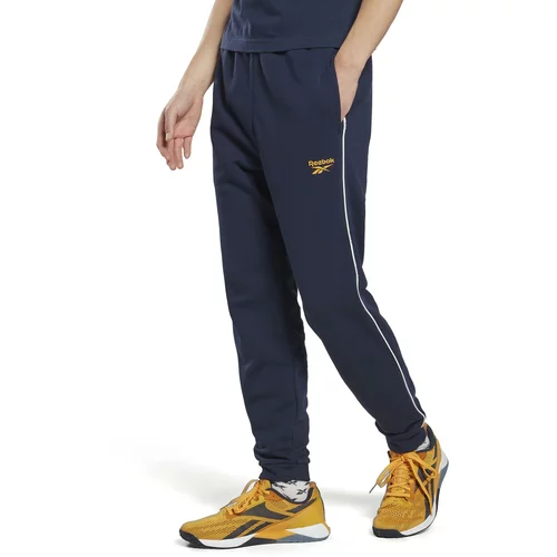 Reebok Sportske hlače mornarsko plava / tamo žuta / bijela
