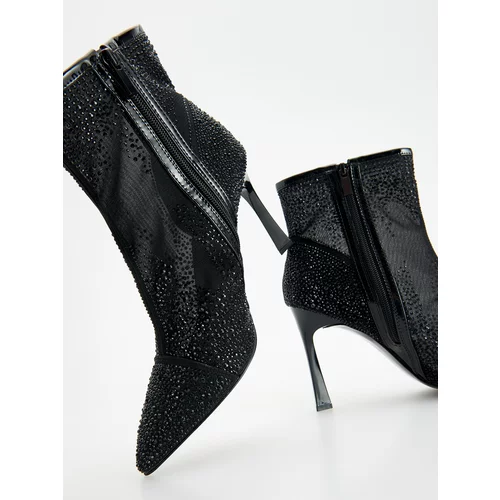Reserved Ladies` ankle boots - črna