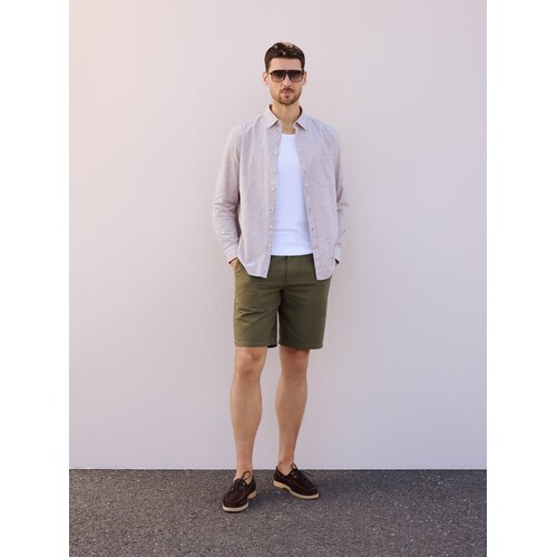 Reserved Jogger kratke hlače od mje&scaron;avine lana - tamnozeleno Cijene