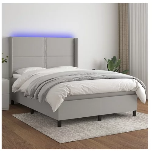  Box spring postelja z vzmetnico LED sv. siva 140x200 cm blago