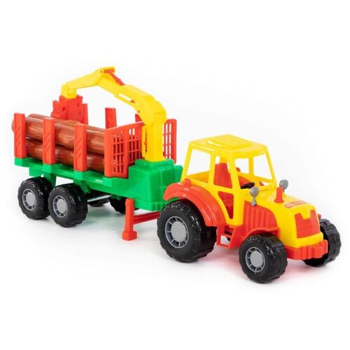 Polesie traktor s balvanima u prikolici Slike