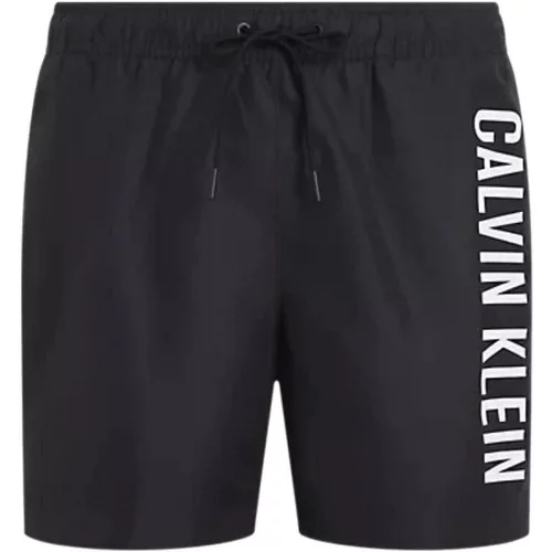 Calvin Klein Jeans Kopalke / Kopalne hlače MEDIUM DRAWSTRING KM0KM01004 Črna