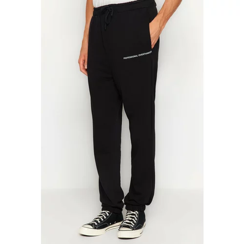 Trendyol Men's Black Oversize/Wide-Fit Minimal Letter Sweatpants.