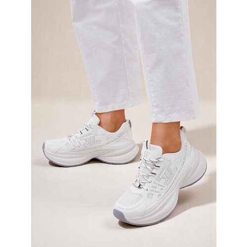 Resti Women's sport sneakers on a thicker sole Roality Cene