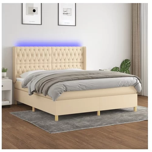  Box spring postelja z vzmetnico LED krem 160x200 cm blago
