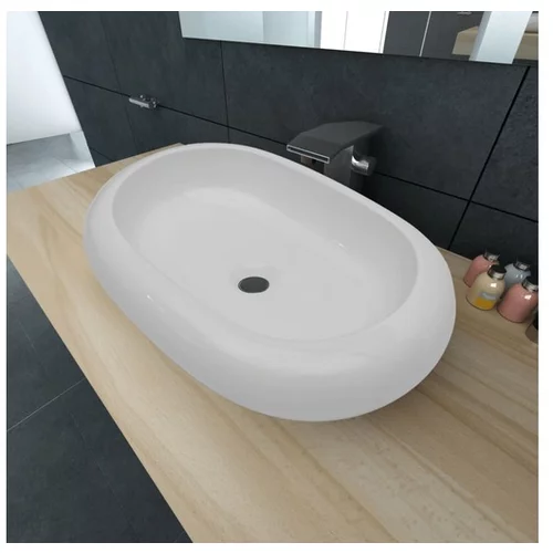  Luksuzni keramični ovalni umivalnik dimenzije 63 x 42 cm