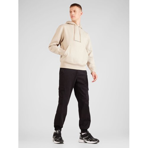 Calvin Klein Jeans Sweater majica svijetlobež / crna Slike