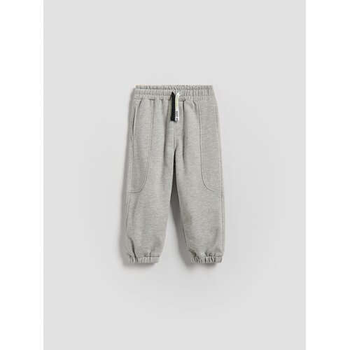 Reserved Pamučne jogger hlače - svijetlo siva Cene